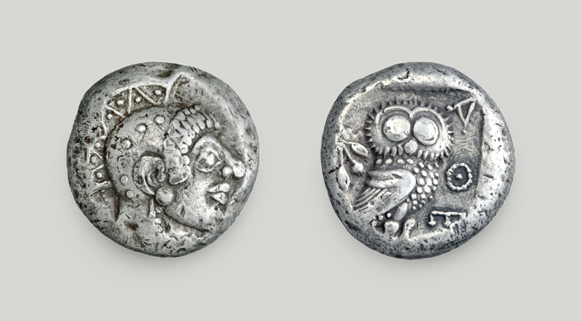 On the obverse, a head of the goddess Athena; on the reverse, an owl, an olive branch and the legend ATHE.  Silver tetradrachm, Athens, 500-480 BCE