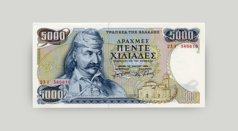 Face of 5,000-drachma banknote. Left: Greek General Theodoros Kolokotronis; bottom: the church of the Holy Apostles in Kalamata.  Face of 5,000-drachma banknote, 1984