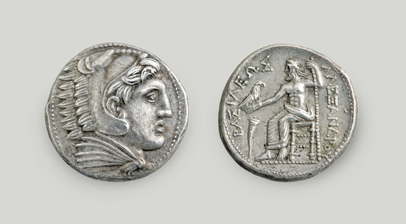Left: on the obverse, a head of Heracles; right: on the reverse, Zeus on his throne.  Silver tetradrachm of Alexander the Great