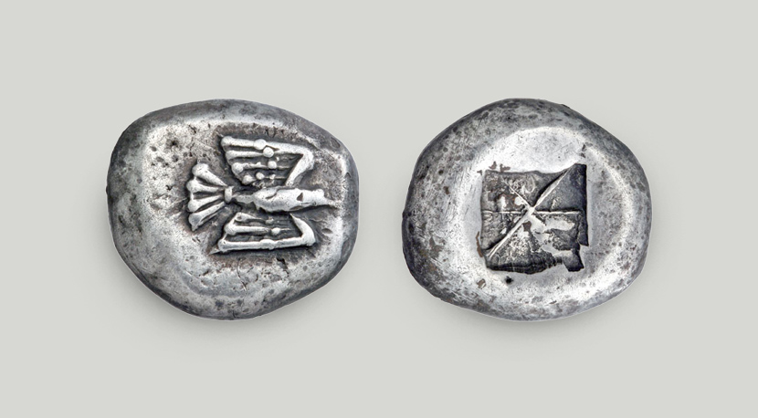 The obverse depicts a flying eagle. An incuse square is struck on the reverse.  Silver stater, Sifnos, 500-525 BCE.
