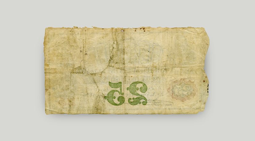 The 25-drachma note is not printed on the back. The denomination on the face is visible in reverse.  Back of 25-drachma banknote