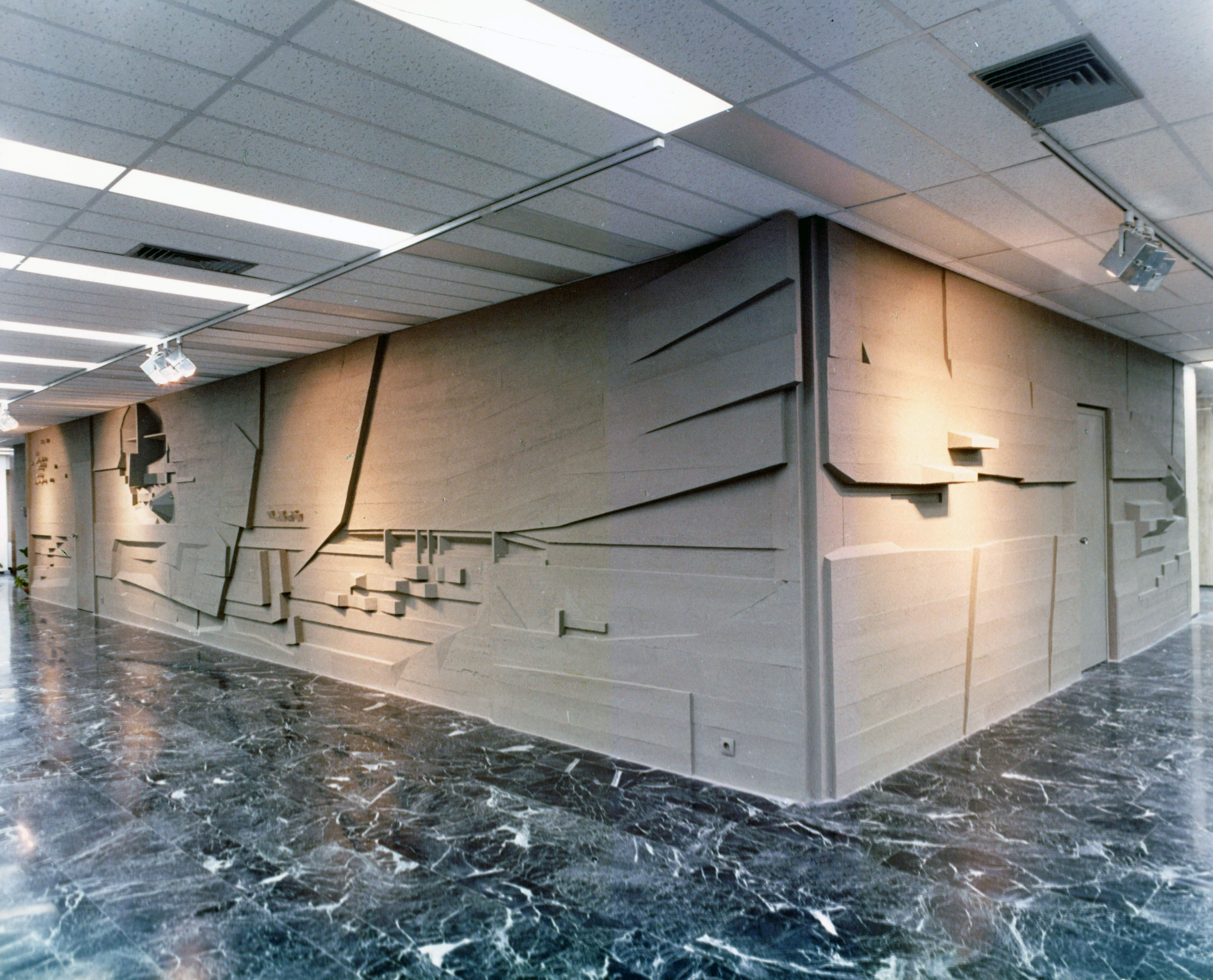 Wall relief by Cosmas Xenakis at the old entrance to the Athens Tower branch. Old picture of wall relief by Cosmas Xenakis