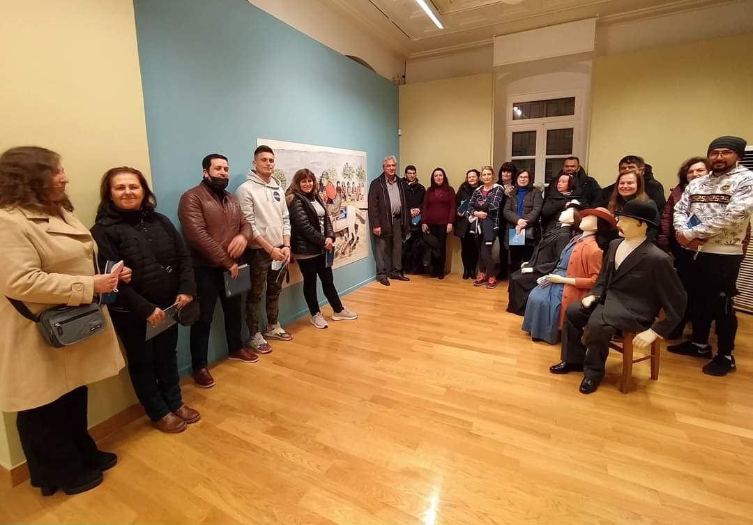 Photo of the exhibition space with visitors. Guided tours at the Alpha Bank Cultural Centre in Nafplio