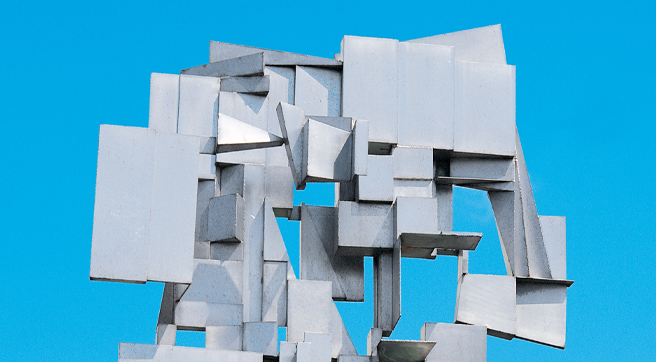 Details of on abstract steel sculpture, resemblant of a tree.