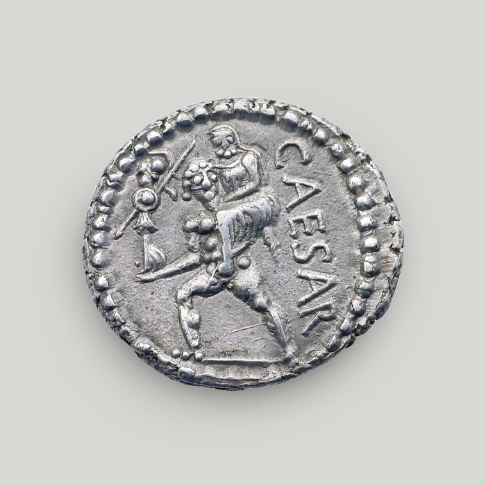 Reverse of silver denarius of Julius Caesar depicting Aeneas carrying his father on his shoulders.  Reverse of silver denarius of Julius Caesar